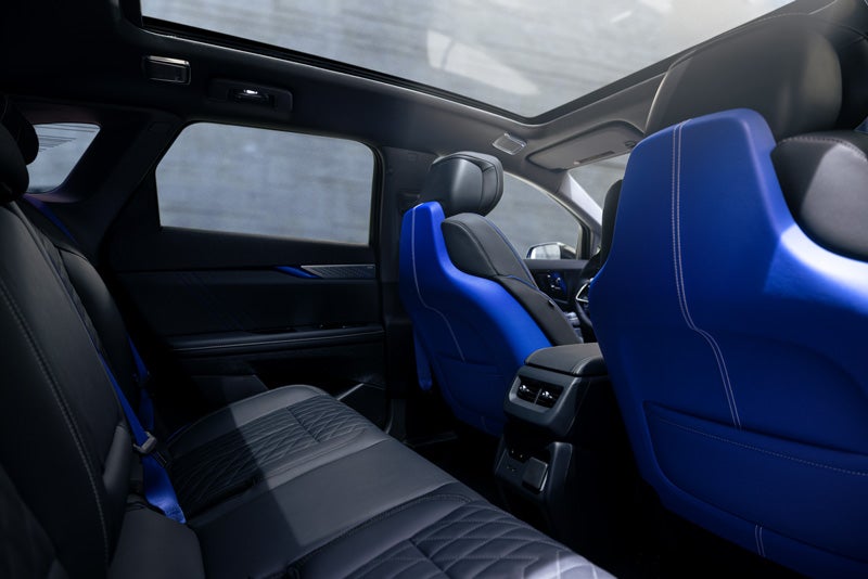 Back Seat View of the 2026 OPTIQ-V Blue Front Seats, Sun Roof, and Interior | Corwin Motors Kalispell Cadillac in Kalispell MT
